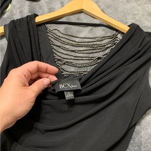 Brand new sexy black mini dress with beaded back